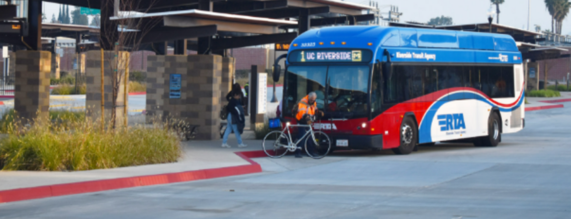 Passengers boarding the RTA Route 1 bus at the Vine Mobility Hub in Downtown Riverside.
