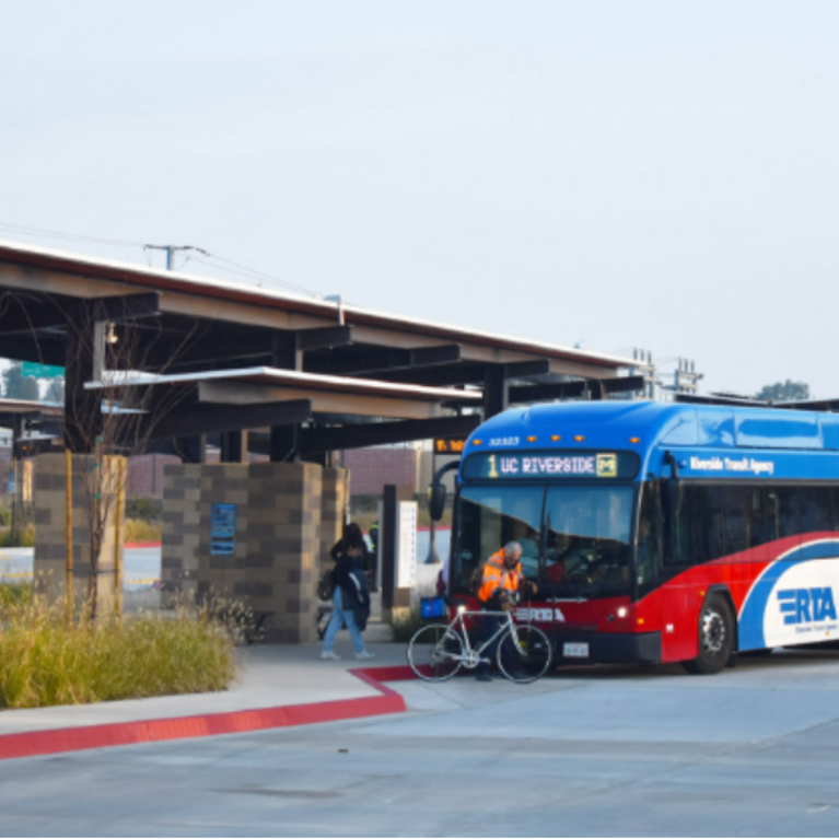 Passengers boarding the RTA Route 1 bus at the Vine Mobility Hub in Downtown Riverside.